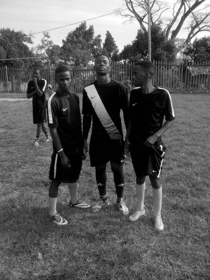 Shafic, Golola and Bombo in a phone